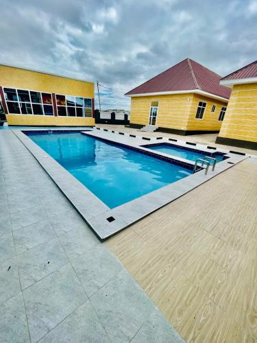 Бассейн в Dodoma Star Lounge или поблизости