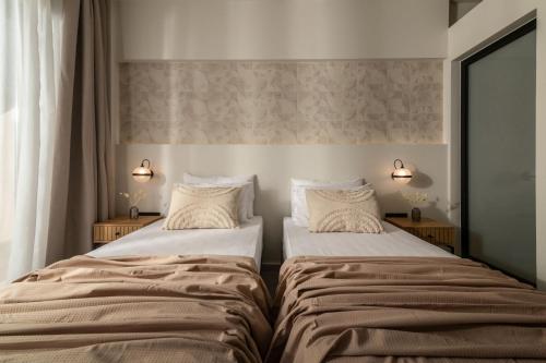 Enigma Rooms - 100m from Alykes beach, by ZanteWizeにあるベッド