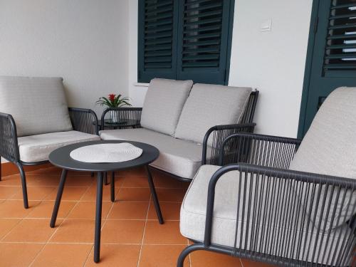 Apartment Perica tesisinde bir oturma alanı