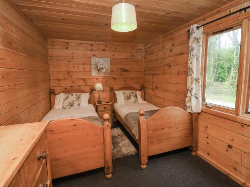 Postel nebo postele na pokoji v ubytování Maple