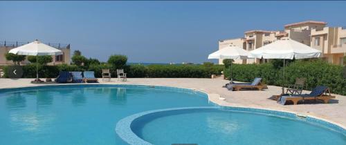 Beach and pools front challet in Ras Sudr families Only عائلات فقط