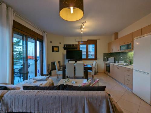 Kuchyňa alebo kuchynka v ubytovaní New Sea & Sun House