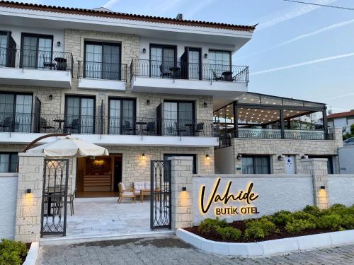 a building with a sign that reads valkyrie built off at Vahide Dalyan in Çeşme