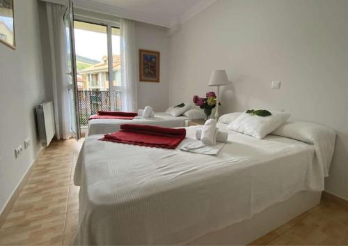 Ένα ή περισσότερα κρεβάτια σε δωμάτιο στο Apartamento Lavenera