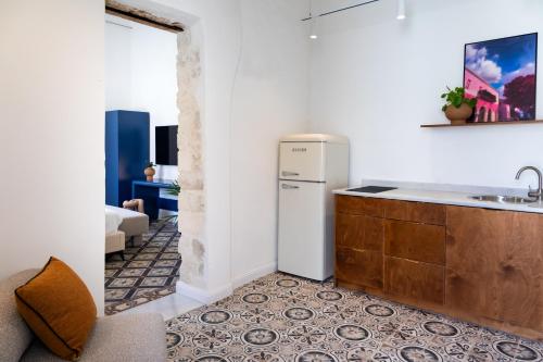Kuchyň nebo kuchyňský kout v ubytování Mila - Boutique Hotel