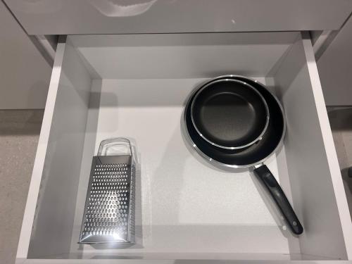 a table with a bowl and a comb on a shelf at Ulu Panorama Residence in Alanya