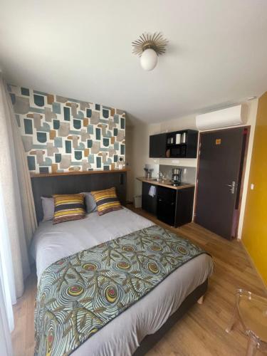 Katil atau katil-katil dalam bilik di Smart Appart Le Havre 105