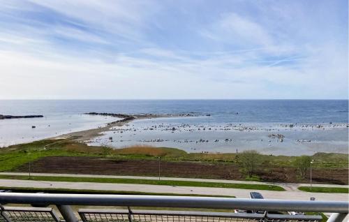 a view of a beach with birds in the water at 2 Bedroom Awesome Apartment In Visby in Visby