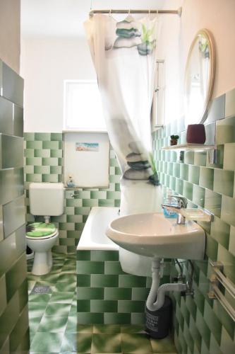 Kúpeľňa v ubytovaní Apartman Miki