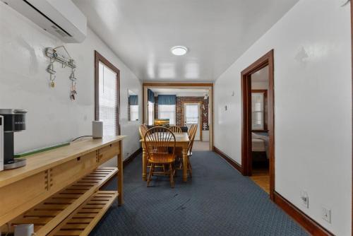 a kitchen and dining room with a table and chairs at 113 E 24Th Ave, 1St Floor in North Wildwood