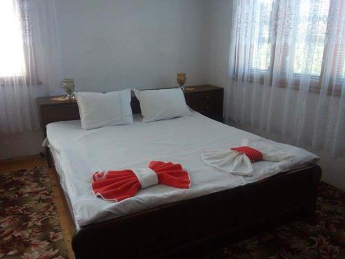 Ένα ή περισσότερα κρεβάτια σε δωμάτιο στο Guest House AHP