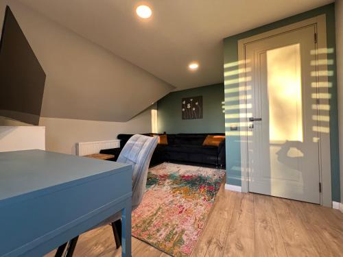 Televisyen dan/atau pusat hiburan di Comfort Apartments Palanga
