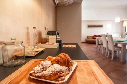 a plate of pastries on a table in a kitchen at Studio with wifi at La Massimina Casal Lumbroso in La Massimina-Casal Lumbroso