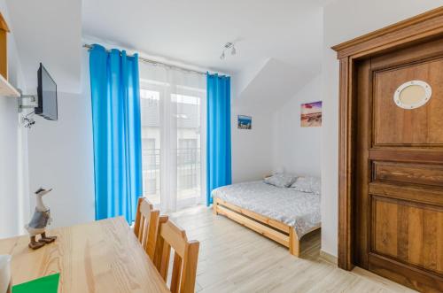 Postel nebo postele na pokoji v ubytování Willa Artus