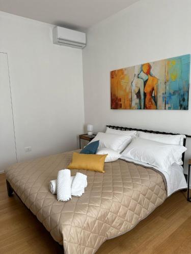 Katil atau katil-katil dalam bilik di B&B L'ULIVO