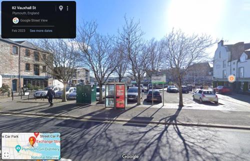 a street with cars parked on the side of the road at The Blue Barbican Flat- spacious, stylish, in a perfect location and accessible in Plymouth