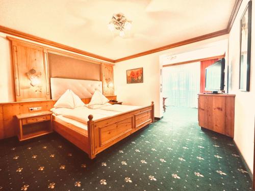 Postel nebo postele na pokoji v ubytování Hotel Das Urbisgut