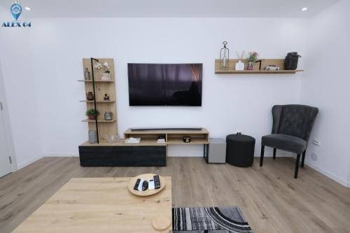 TV a/nebo společenská místnost v ubytování Alex 04