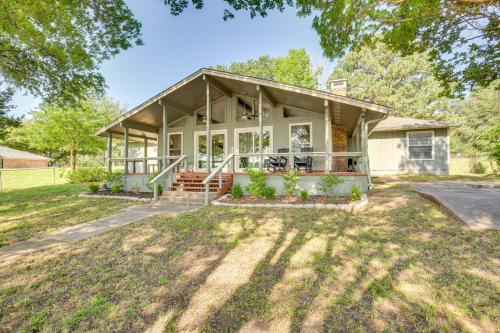 an image of a house with a porch at Private Dock and Fire Pit Cedar Creek Reservoir Gem in Gun Barrel City