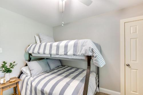 a bedroom with two bunk beds in a room at Private Dock and Fire Pit Cedar Creek Reservoir Gem in Gun Barrel City