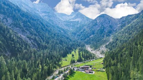 an aerial view of a valley in the mountains at Alpengasthof Gern Alm in Pertisau