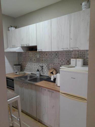 Una cocina o zona de cocina en HARMONY