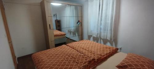 Postel nebo postele na pokoji v ubytování Apartments Ten Sen