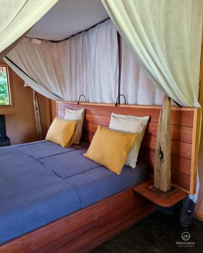 Un ou plusieurs lits dans un hébergement de l'établissement Miavaka Lodge