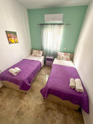 Ένα ή περισσότερα κρεβάτια σε δωμάτιο στο Salora Studio-Apartments