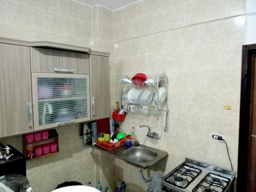 Kuchyň nebo kuchyňský kout v ubytování قرية بلولاجون راس سدر شاليه فاخر للايجار for families only