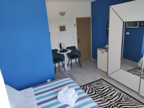 Postel nebo postele na pokoji v ubytování B&B Buzolic