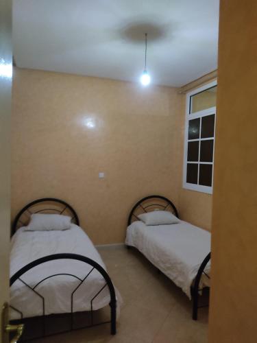 Postel nebo postele na pokoji v ubytování Papito