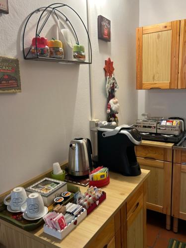 a kitchen with a counter top with food on it at La Tana del Grillo in Pitigliano