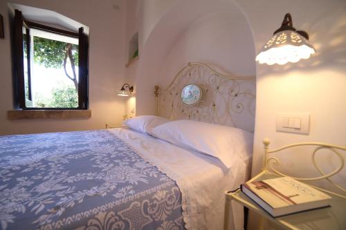 Un pat sau paturi într-o cameră la Agriturismo Vòioro
