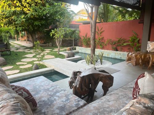 Jardín al aire libre en Lasai Villas
