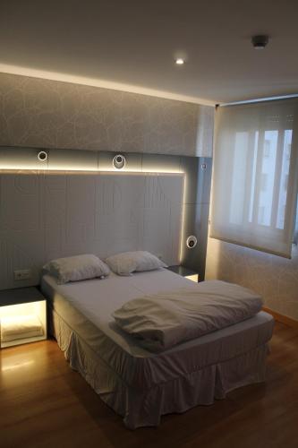 Postel nebo postele na pokoji v ubytování Mola! Hostel Burgos