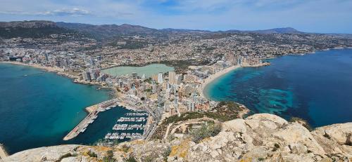 an aerial view of a city next to the ocean at Casa Amina in Calpe