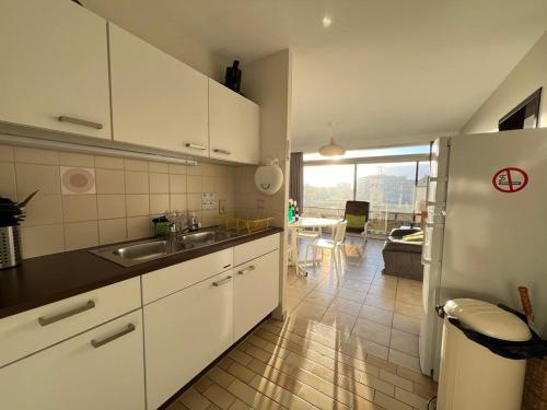Kuchyň nebo kuchyňský kout v ubytování Appartement Residentie Astrid met private parking
