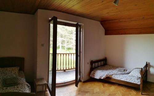 Postel nebo postele na pokoji v ubytování Pine corner Mojkovac