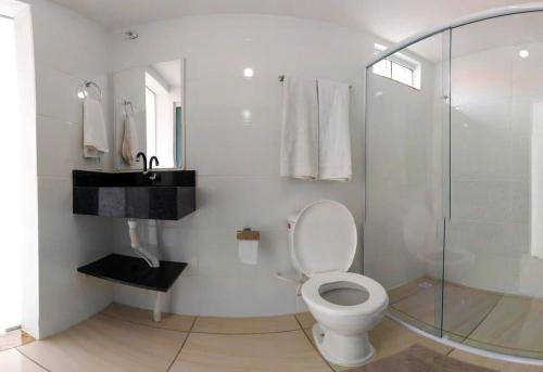 Vonios kambarys apgyvendinimo įstaigoje Suítes Moreira