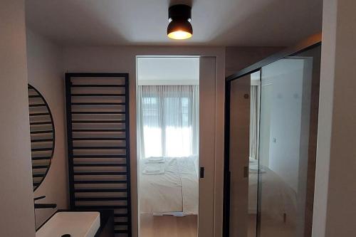 Koupelna v ubytování Trendy flat in gouden winkeldriehoek nabij strand