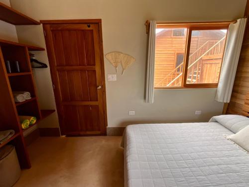 Ein Bett oder Betten in einem Zimmer der Unterkunft Anicca Aldea