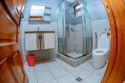Phòng tắm tại Kigali Wings Apartment 1