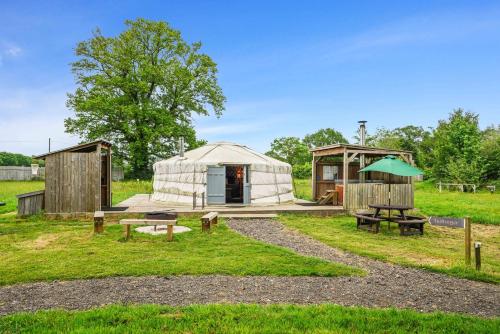 Un jardín fuera de Glamp and Tipple Ltd