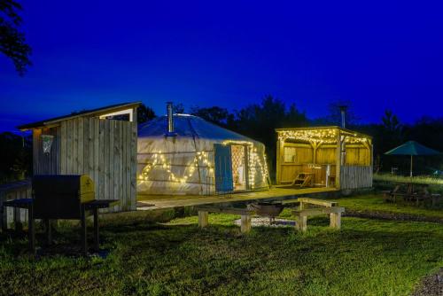 Un jardín fuera de Glamp and Tipple Ltd