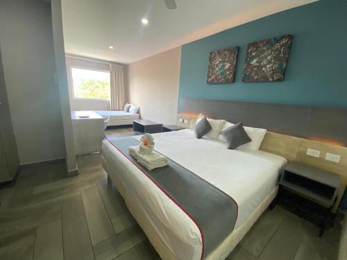 Katil atau katil-katil dalam bilik di Illusion Xpress I Attraction Hotel Deluxe