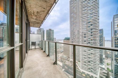 a balcony with a view of a city at GSuite Express Downtown Toronto in Toronto