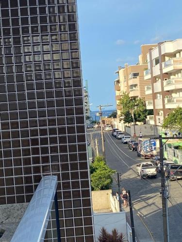 a view of a building with a glass window at A35 - Breeze 03 dormitórios in Bombas