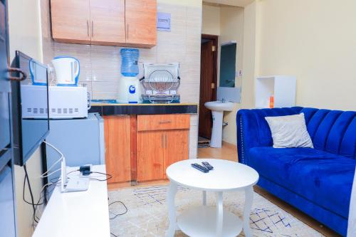 Η κουζίνα ή μικρή κουζίνα στο Sunlit Furnished Studio, Kisii