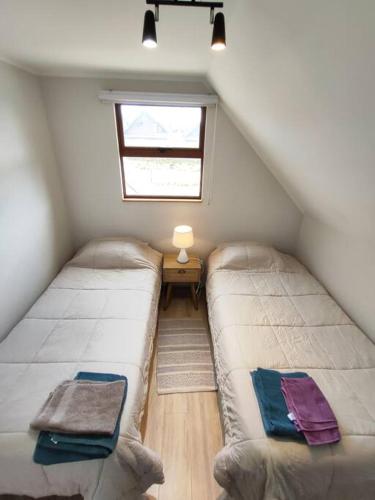 Cama o camas de una habitación en Casa equipada en Condominio
